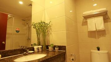 Shower, free toiletries, hair dryer, slippers