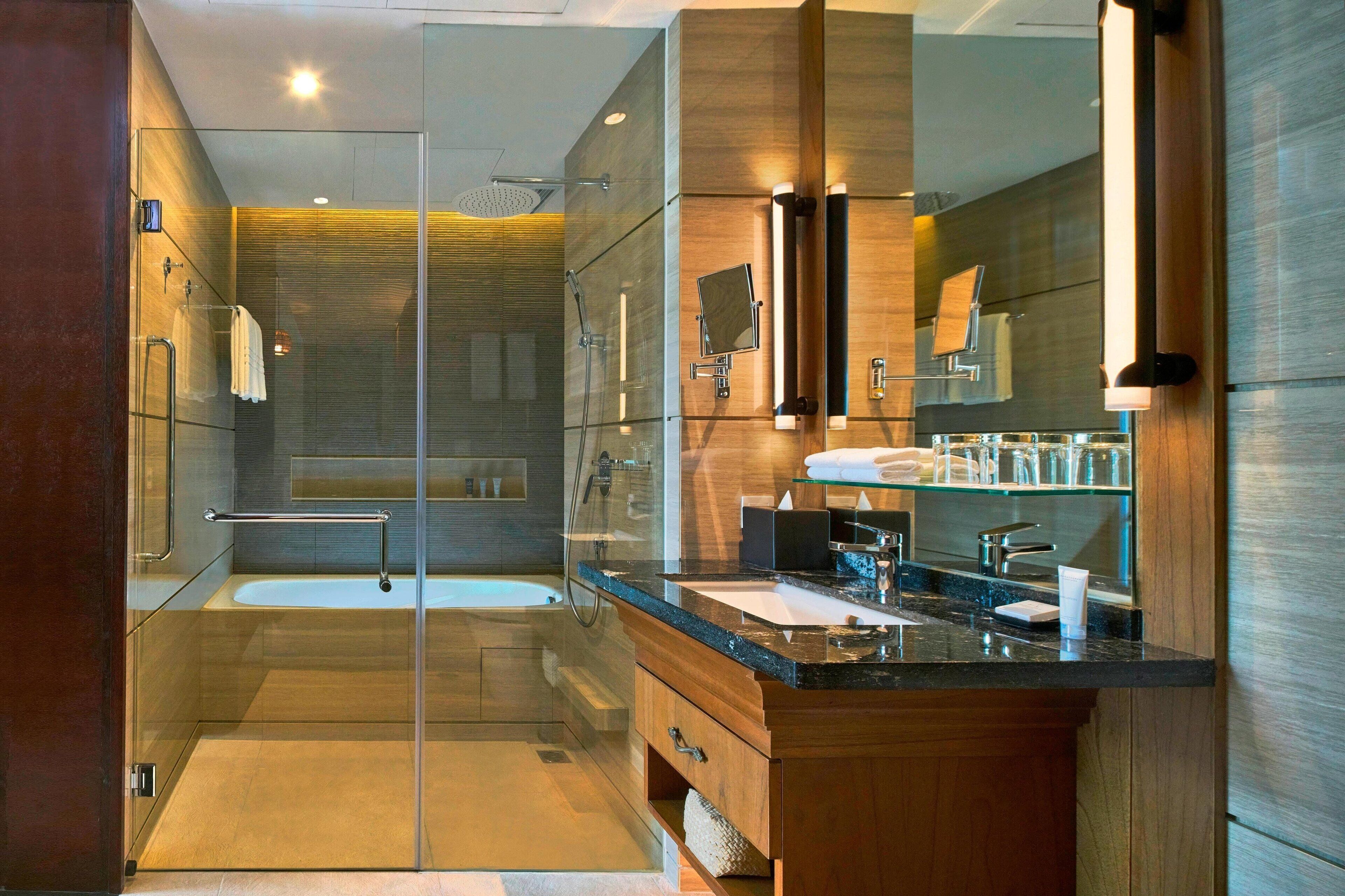 combined shower/bathtub, free toiletries, hair dryer, slippers