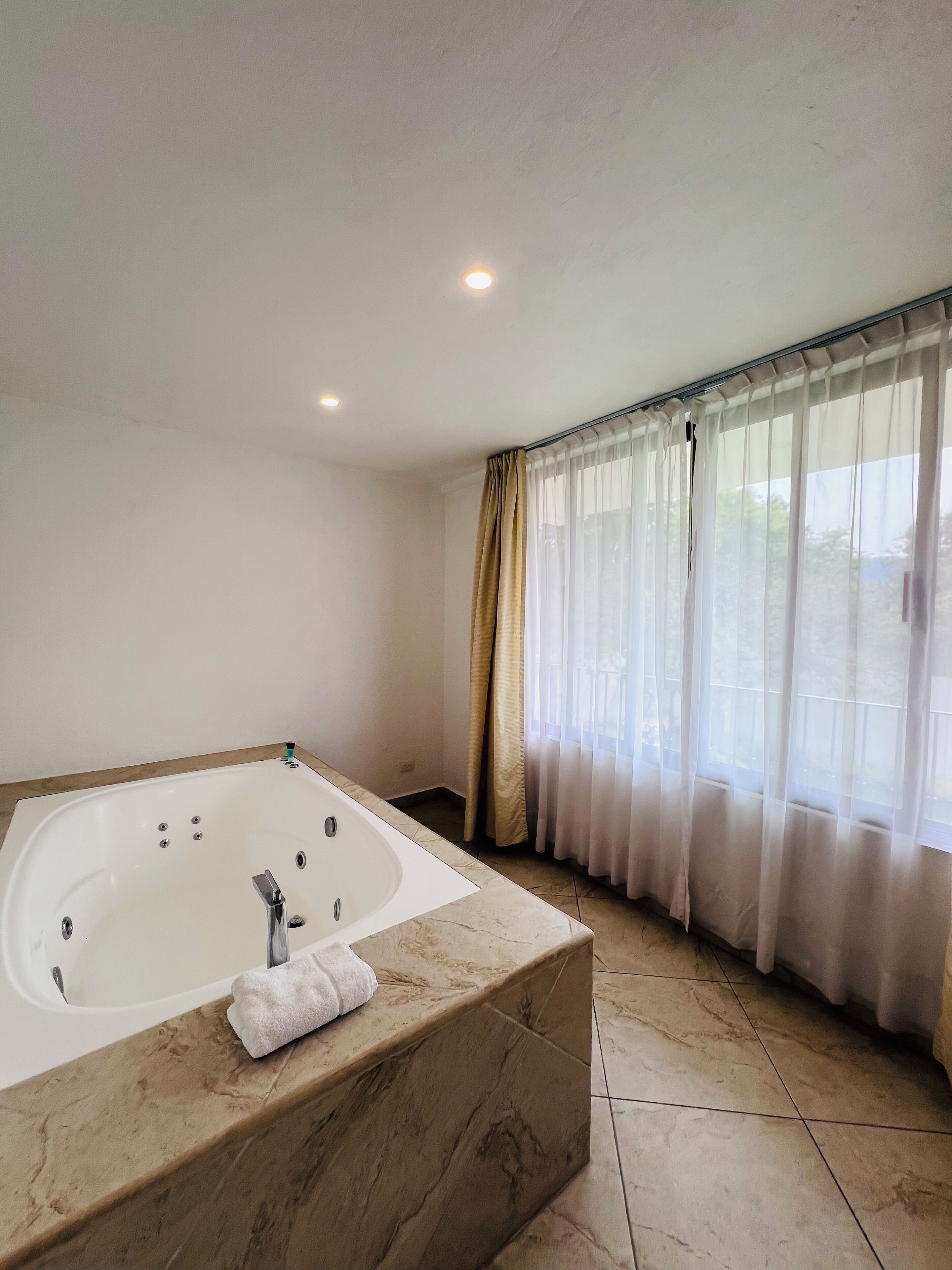 master suite | bathroom | free toiletries, hair dryer, towels