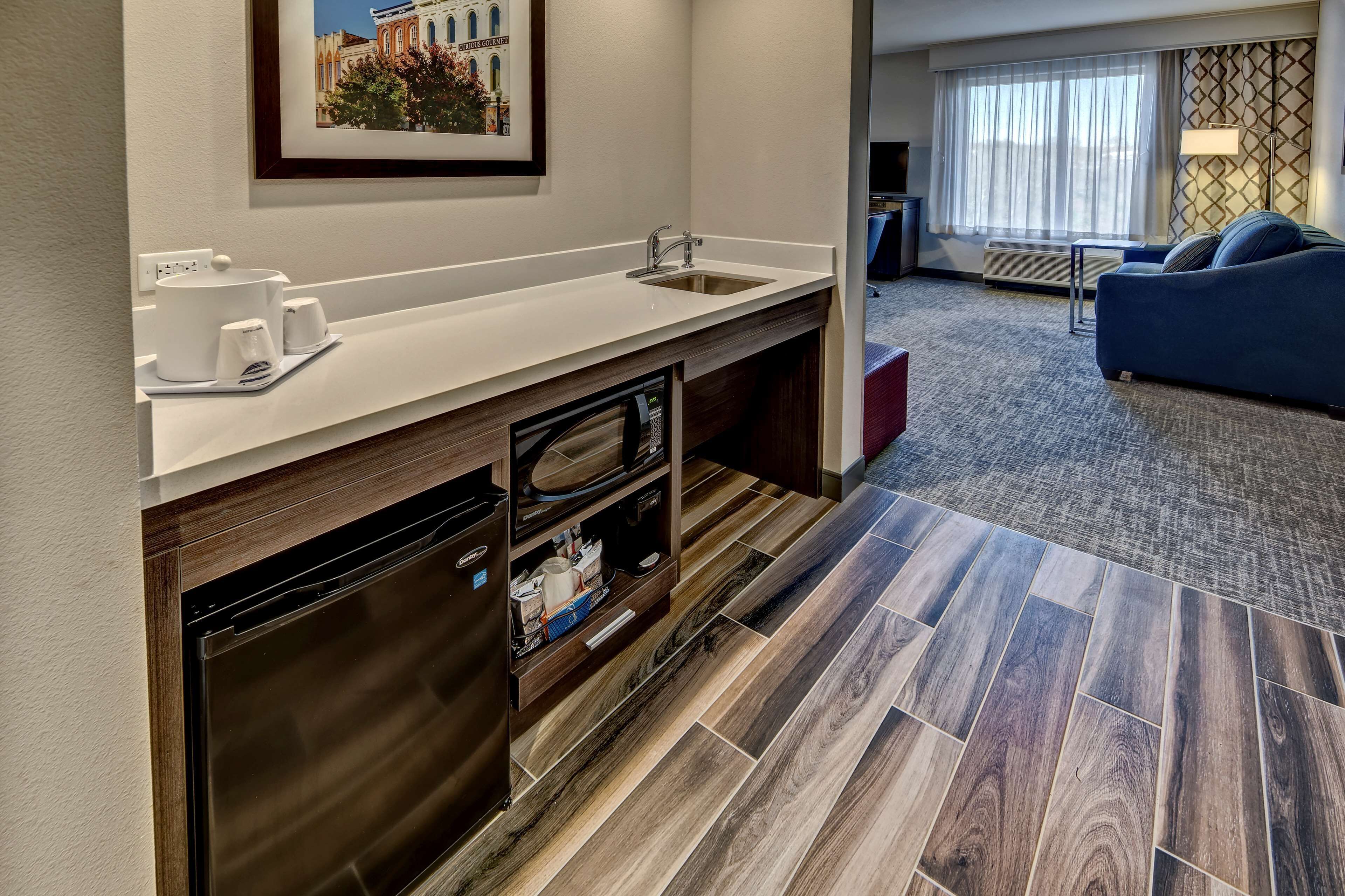 desk, blackout curtains, iron/ironing board, free cots/infant beds