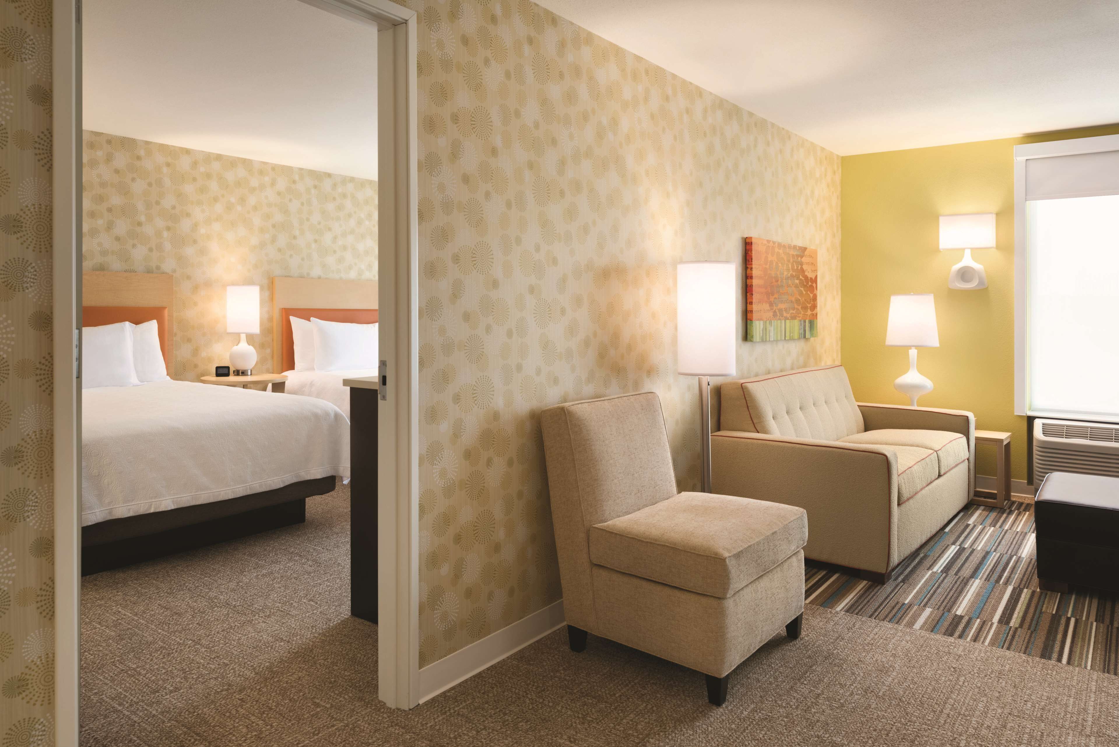 suite 1 bedroom 2 queen beds non smoking | living area | tv