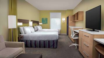 Premium bedding, desk, laptop workspace, blackout curtains