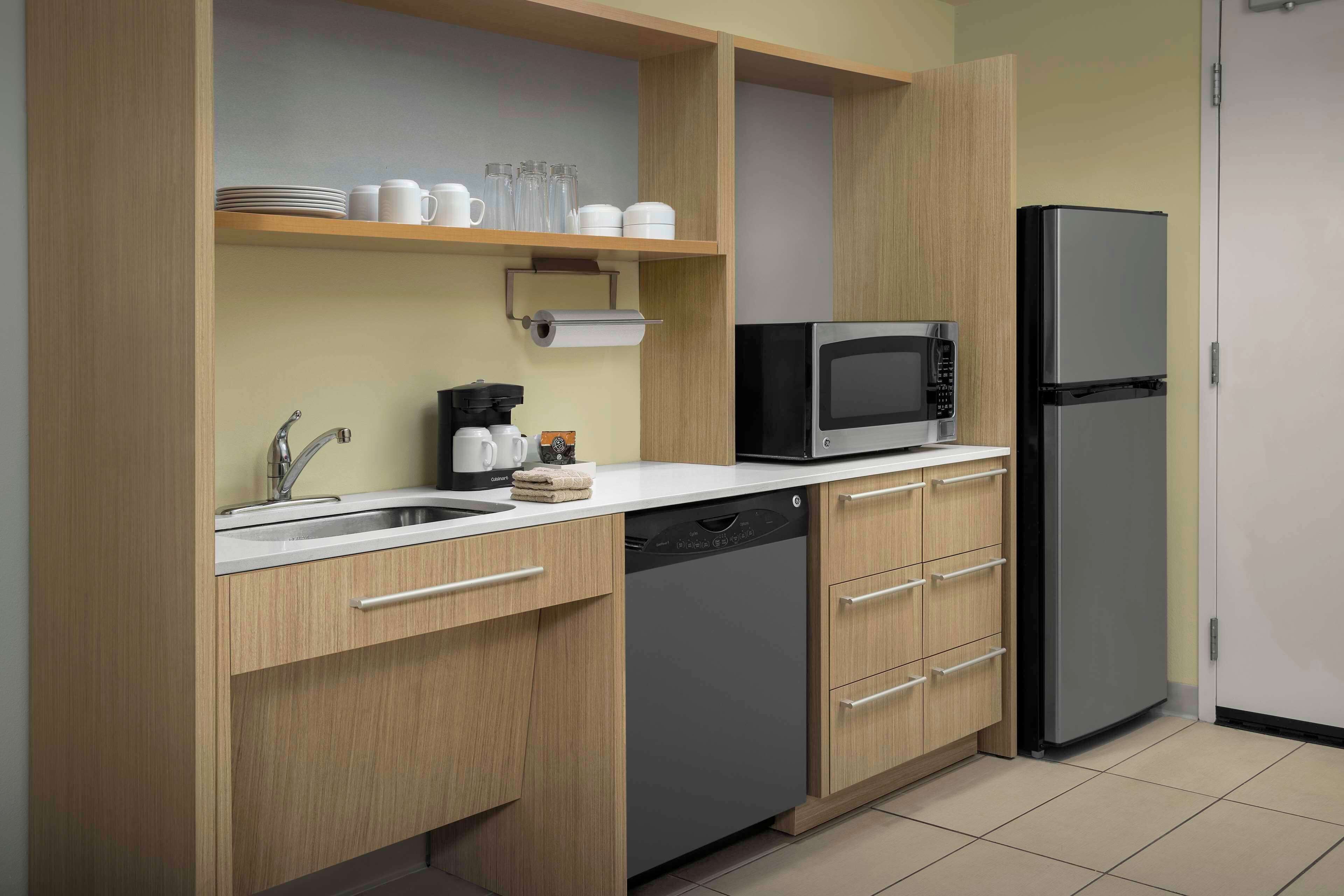 full-sized fridge, microwave, dishwasher, coffee/tea maker