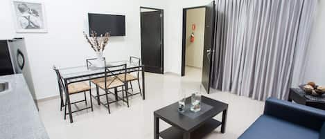 Junior Studio Suite, 1 Bedroom | Living area | 32-inch flat-screen TV with cable channels, TV