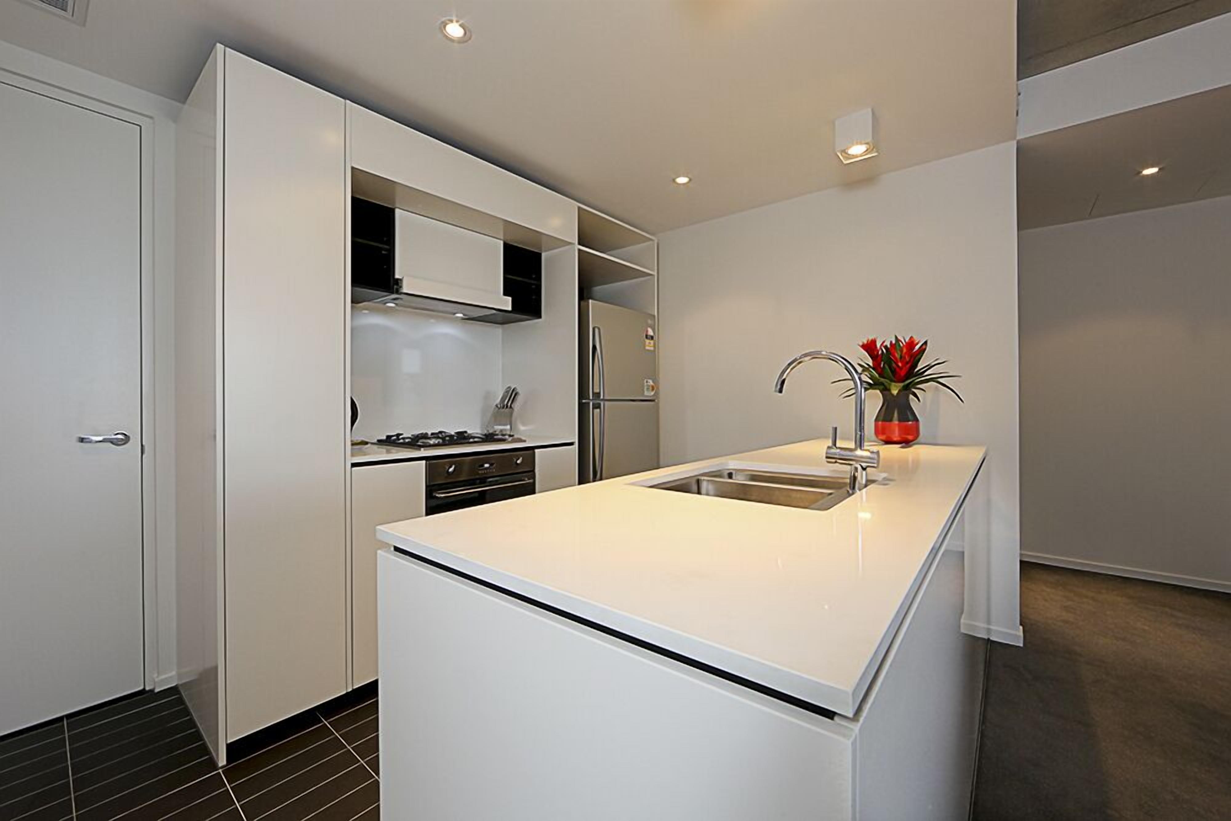 Apartment, 1 Queen Bed | Private kitchen | Fridge, microwave, stovetop, dishwasher