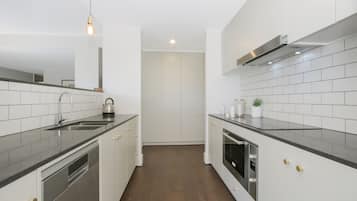 Apartment, 2 Bedrooms (The Prince 206) | Private kitchen | Full-sized fridge, microwave, oven, stovetop