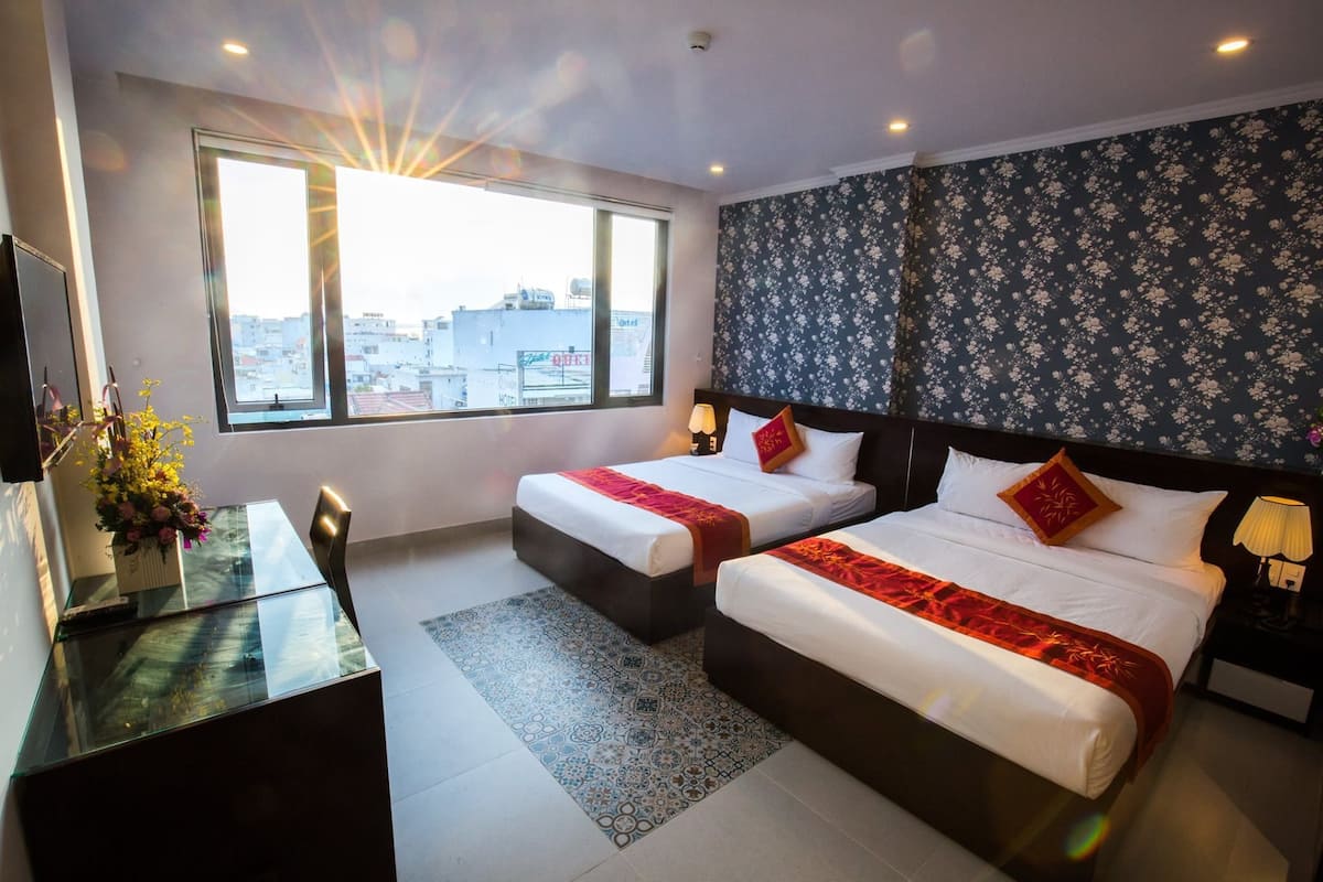 Deluxe Quadruple Room | Minibar, desk, free WiFi