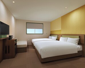 A hotel room with two beds, a flat-screen TV, a coffee maker, and a window with blinds. - CVS Bay Hotel Annex (Ichikawa)