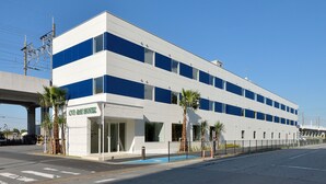 A modern hotel with a flat facade, large windows, and a blue and white color scheme. - CVS Bay Hotel Annex (Ichikawa)