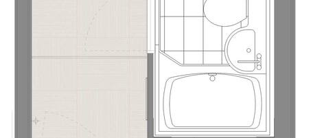 A floor plan with a kitchen, dining area, and a bathroom.