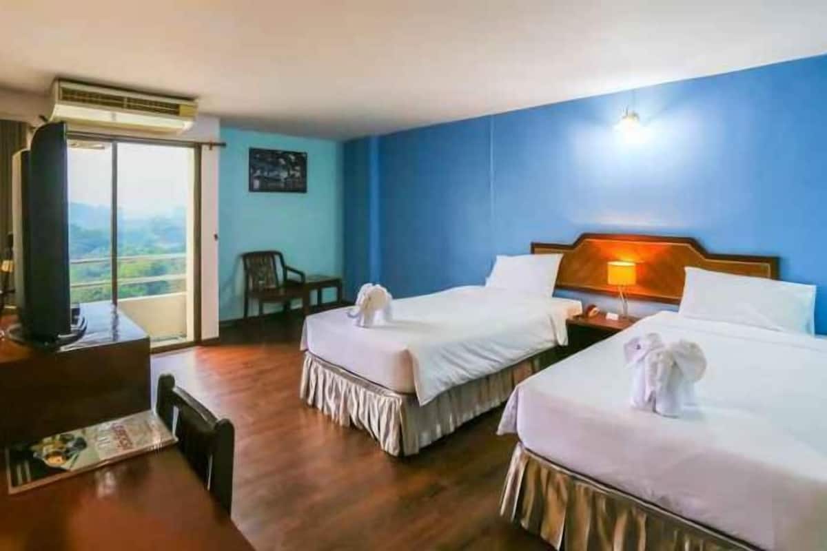 Desk, blackout curtains, free WiFi, bed sheets