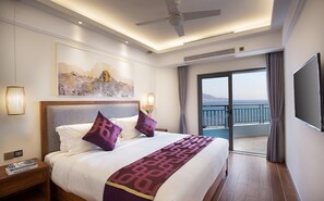 Deluxe Suite, 2 Bedrooms | Minibar, in-room safe, desk, blackout curtains - Tianze Beach Resort Sanya (Sanya)