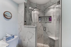 Shower, hair dryer, towels, soap