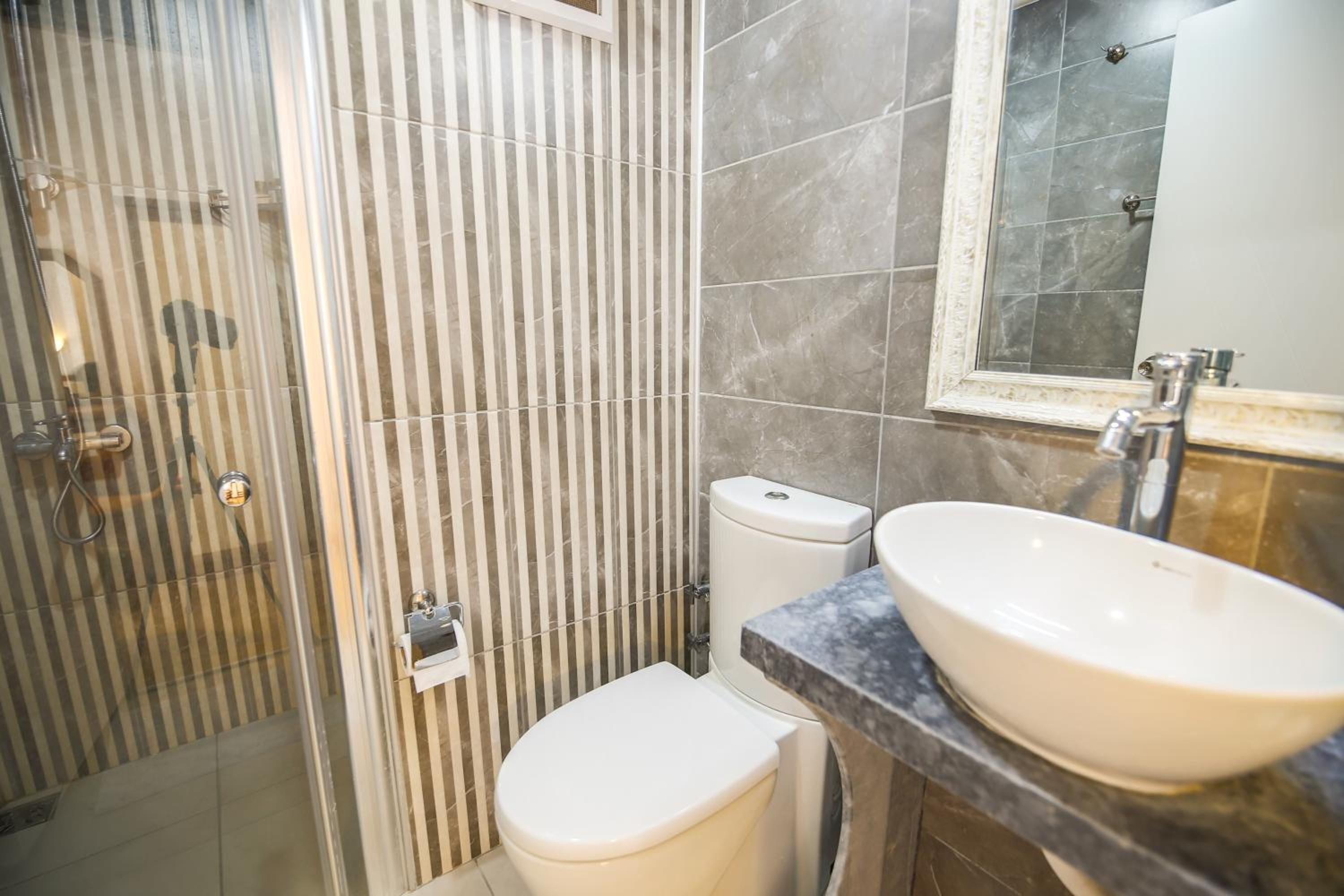 shower, free toiletries, hair dryer, slippers