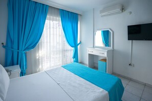 Standaard kamer, 1 twee- of 2 eenpersoonsbedden | Luxe beddengoed, een minibar met enkele gratis items