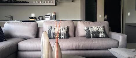 Luxury Apartment, 1 Bedroom, Partial Ocean View | Living area | 48-inch LED TV with satellite channels, TV