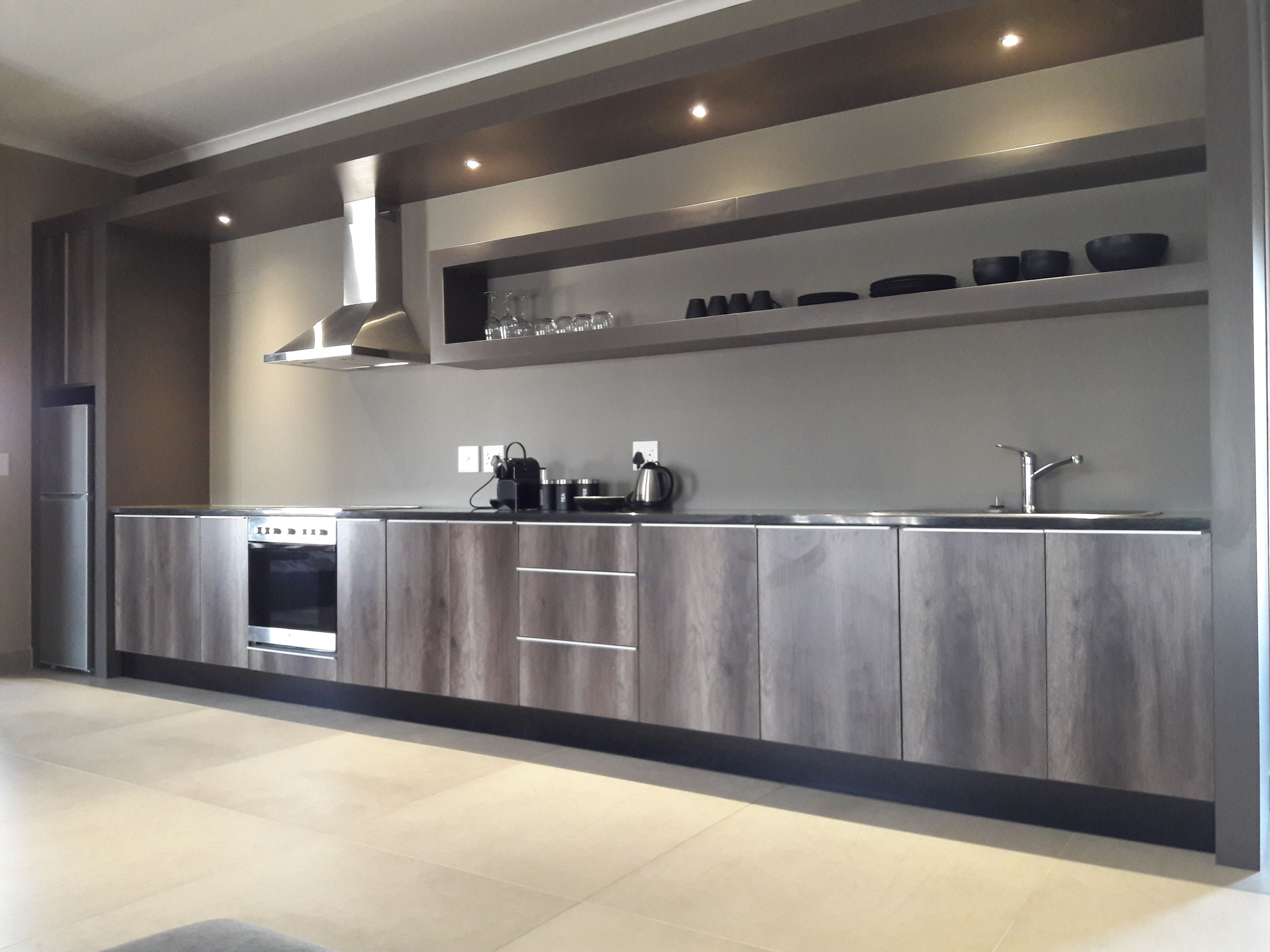 Luxury Apartment, 1 Bedroom, Partial Ocean View | Private kitchenette | Fridge, oven, stovetop, espresso maker