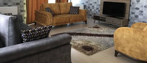 Family Apartment, 2 Bedrooms | Living room | LCD TV