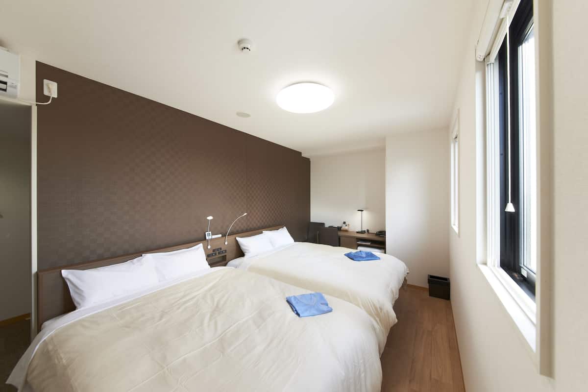 twin room | 1 bedroom, premium bedding, down duvets, in-room safe