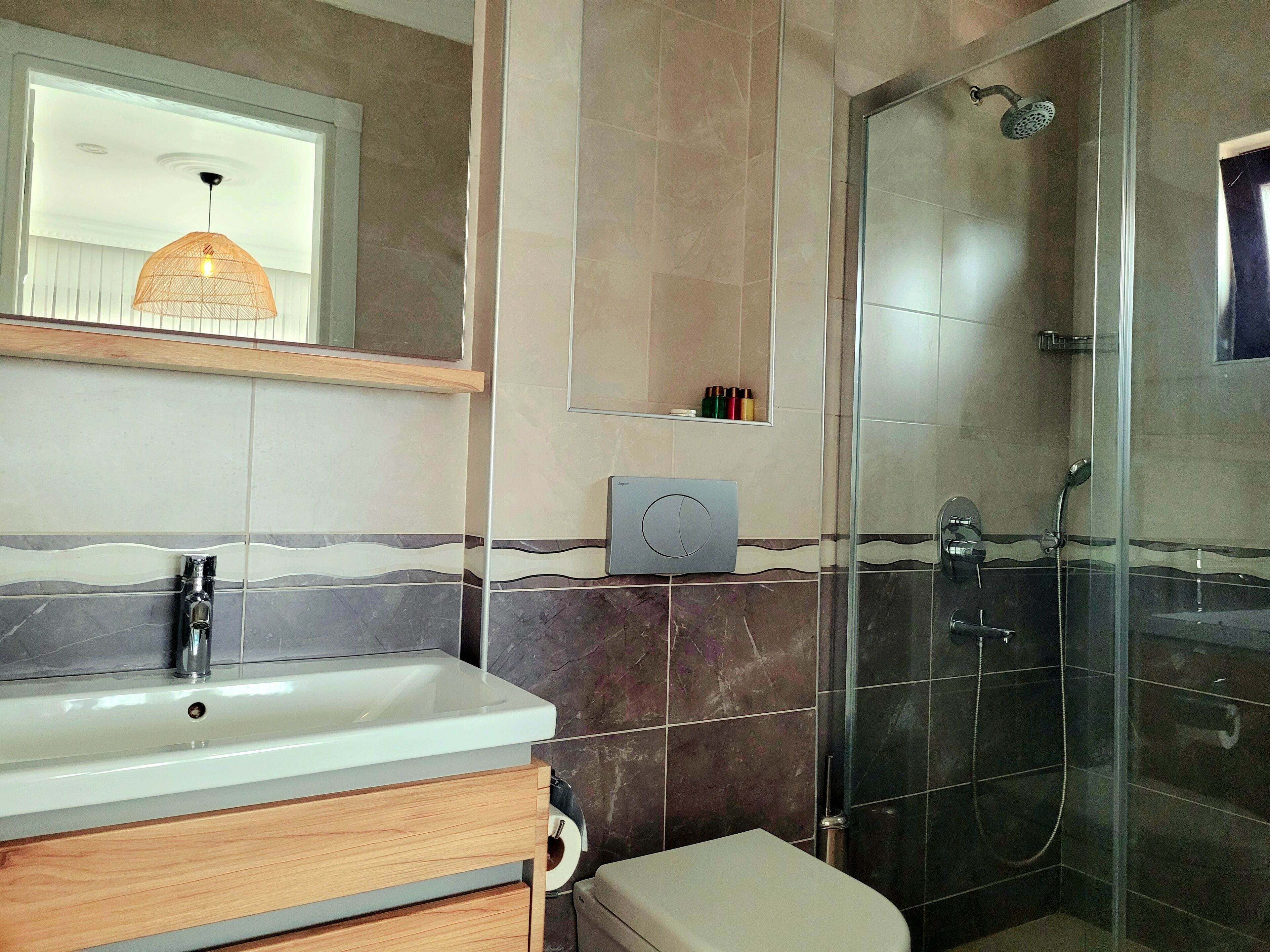 deluxe double room, balcony | bathroom | shower, free toiletries, hair dryer, slippers