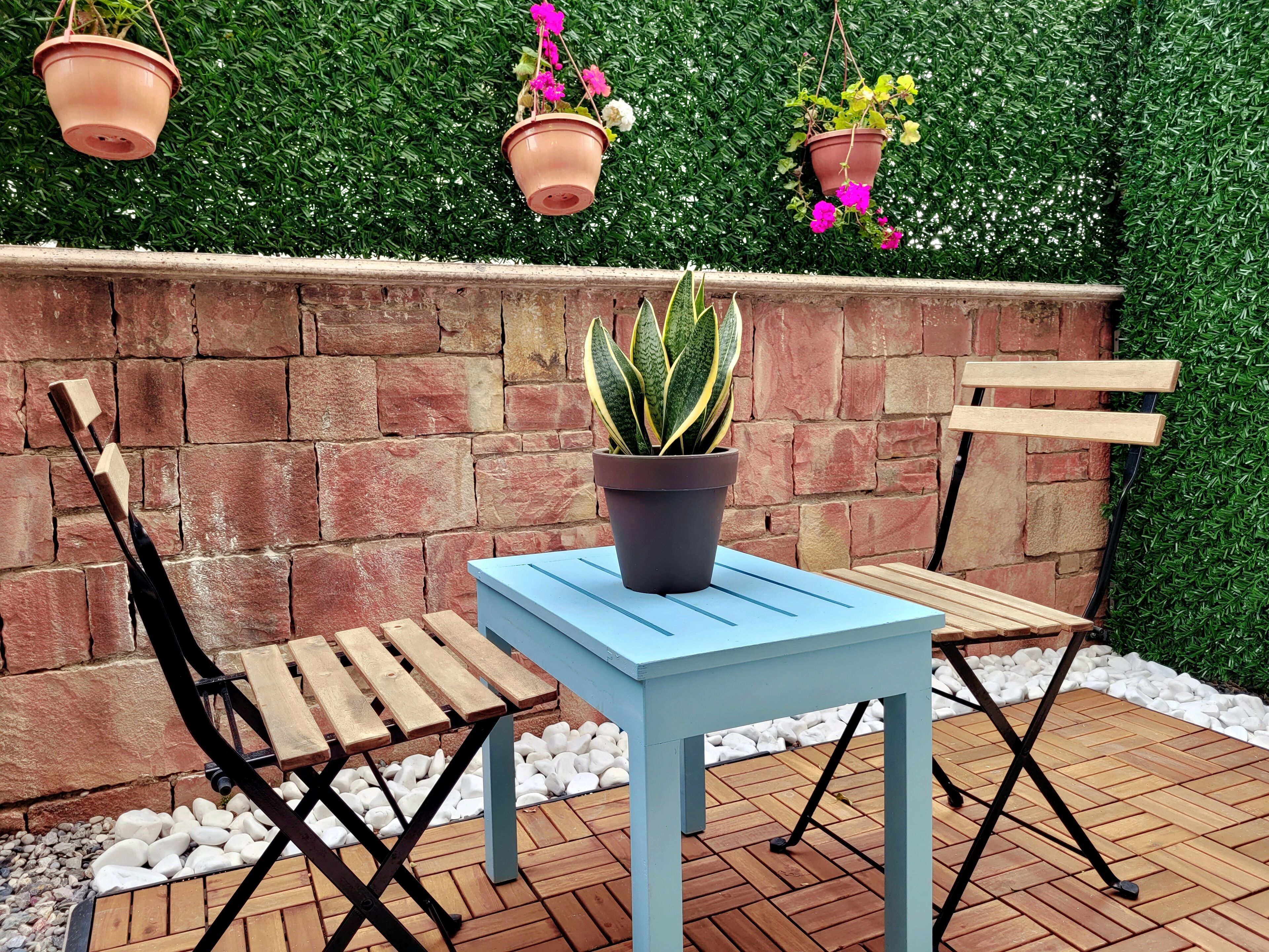 deluxe double room, garden view | living area | led tv