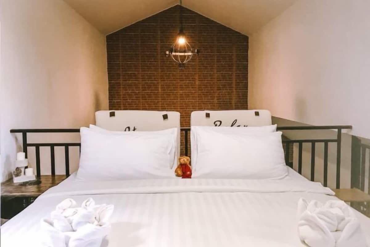 Desk, blackout drapes, rollaway beds (surcharge), WiFi (free)