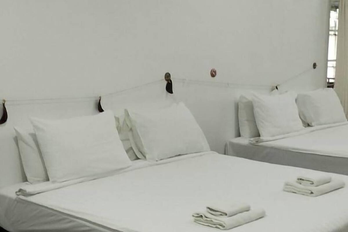 Desk, blackout curtains, rollaway beds, free WiFi