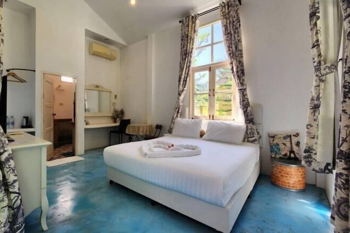 Desk, blackout drapes, rollaway beds (surcharge), WiFi (free)