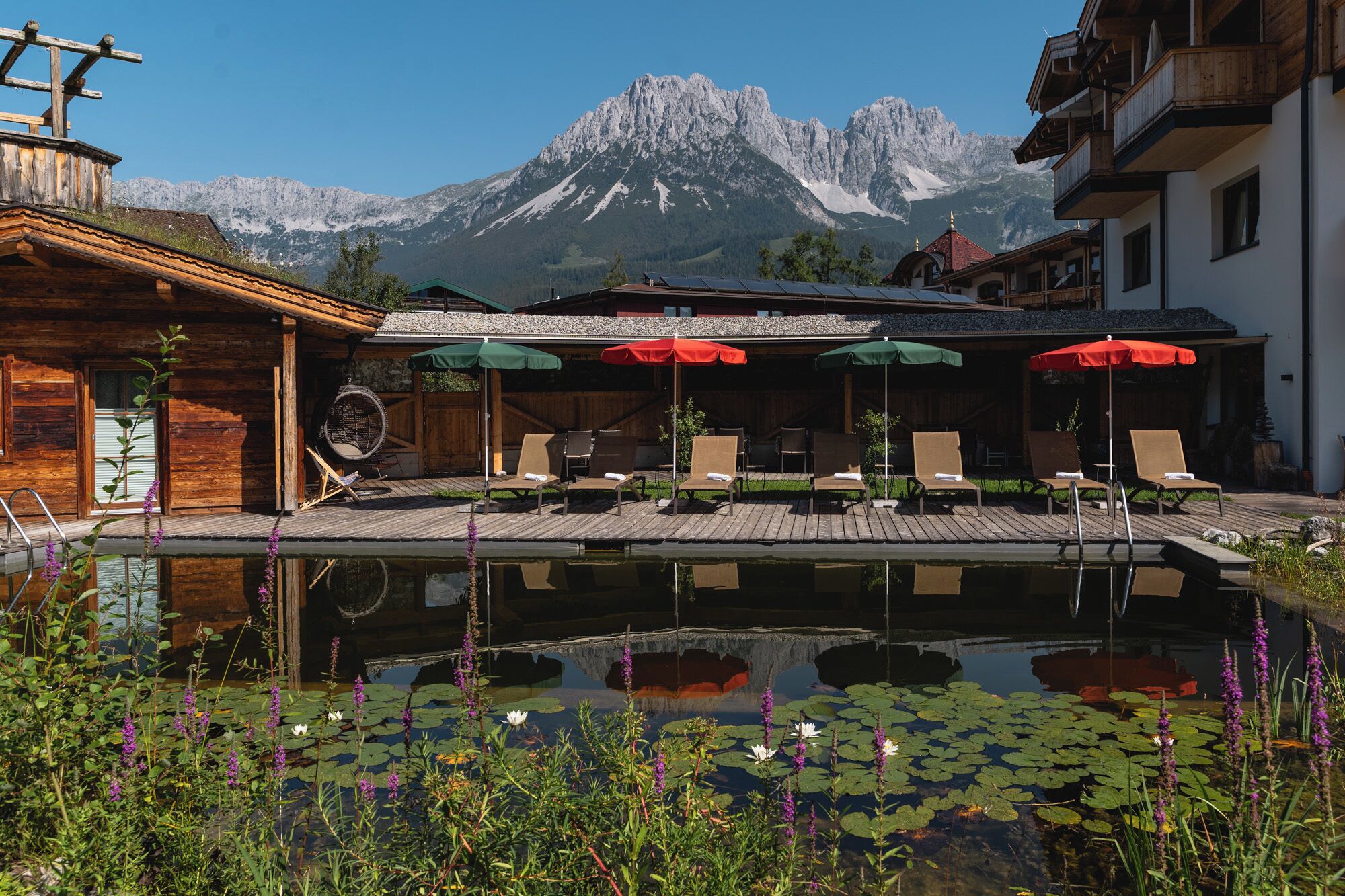 Seasonal outdoor pool, pool umbrellas, pool loungers