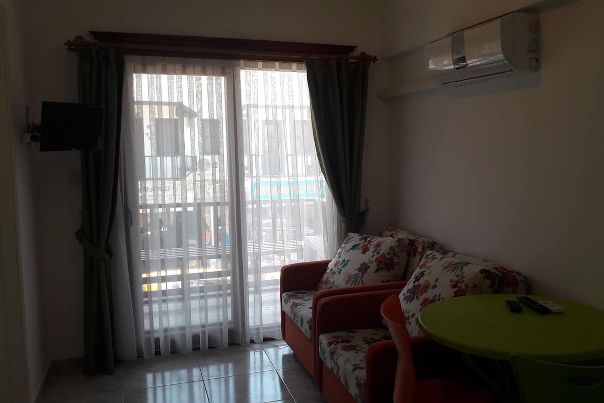 Family Apartment, 1 Bedroom | Living area | LCD TV