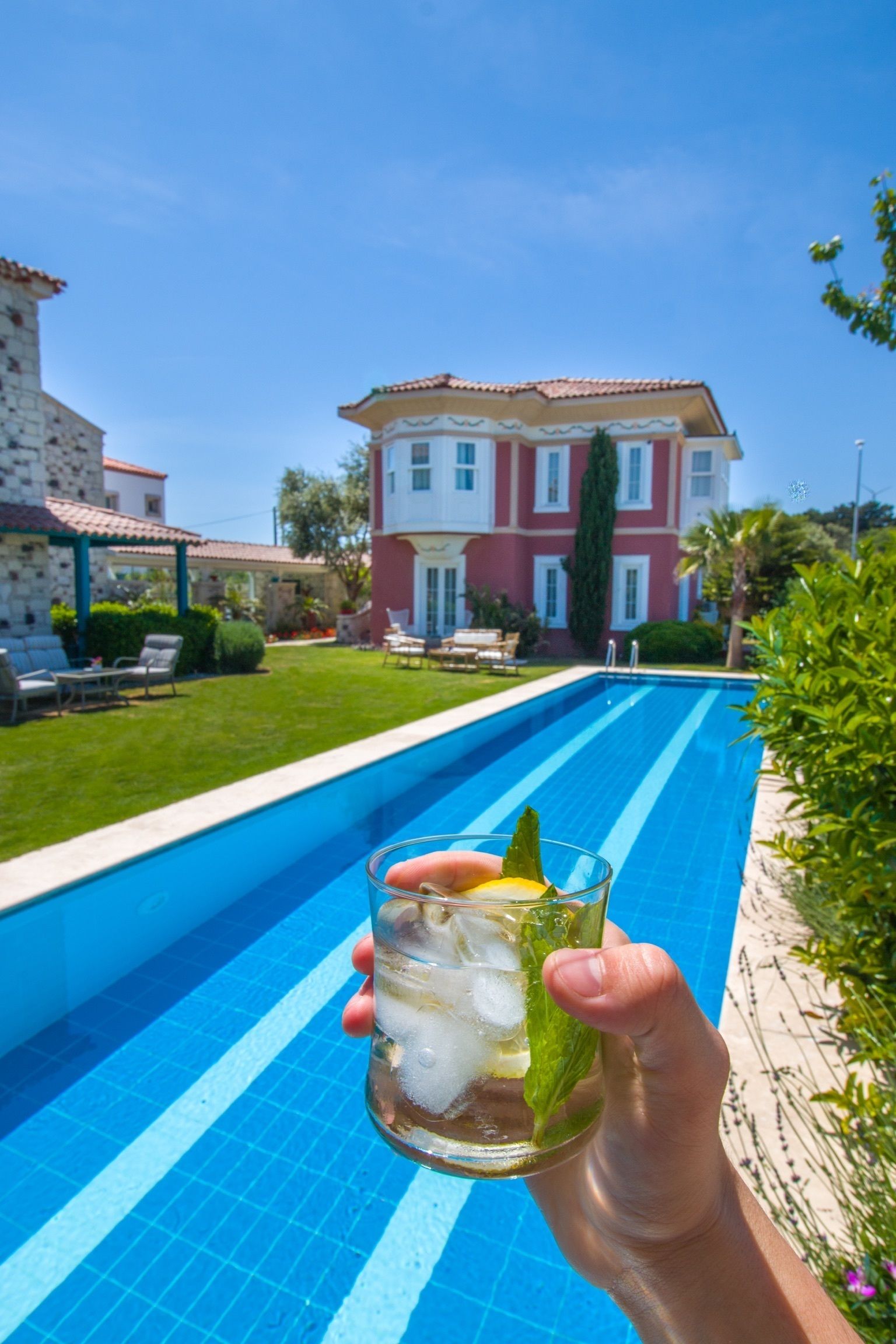 outdoor pool, pool umbrellas, pool loungers