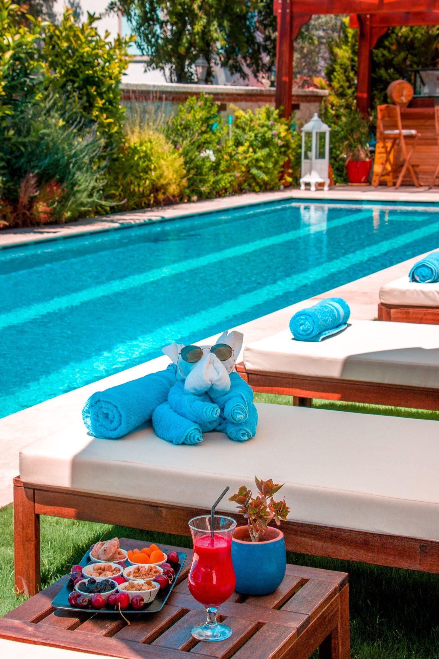 outdoor pool, pool umbrellas, pool loungers