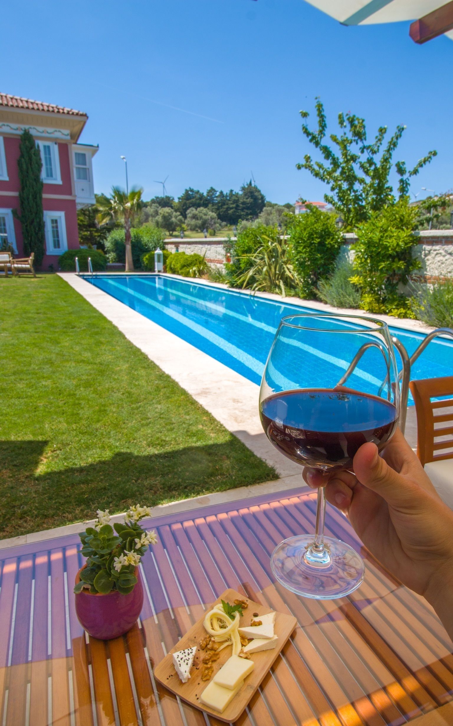 outdoor pool, pool umbrellas, pool loungers