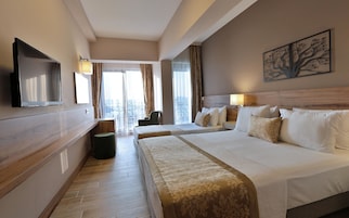 Quarto família, vista para o mar | Roupas de cama premium, frigobar, cofres nos quartos, escrivaninha