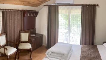 Shower, hair dryer, slippers, towels