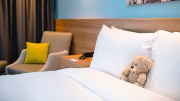 Premium bedding, down comforters, in-room safe, desk