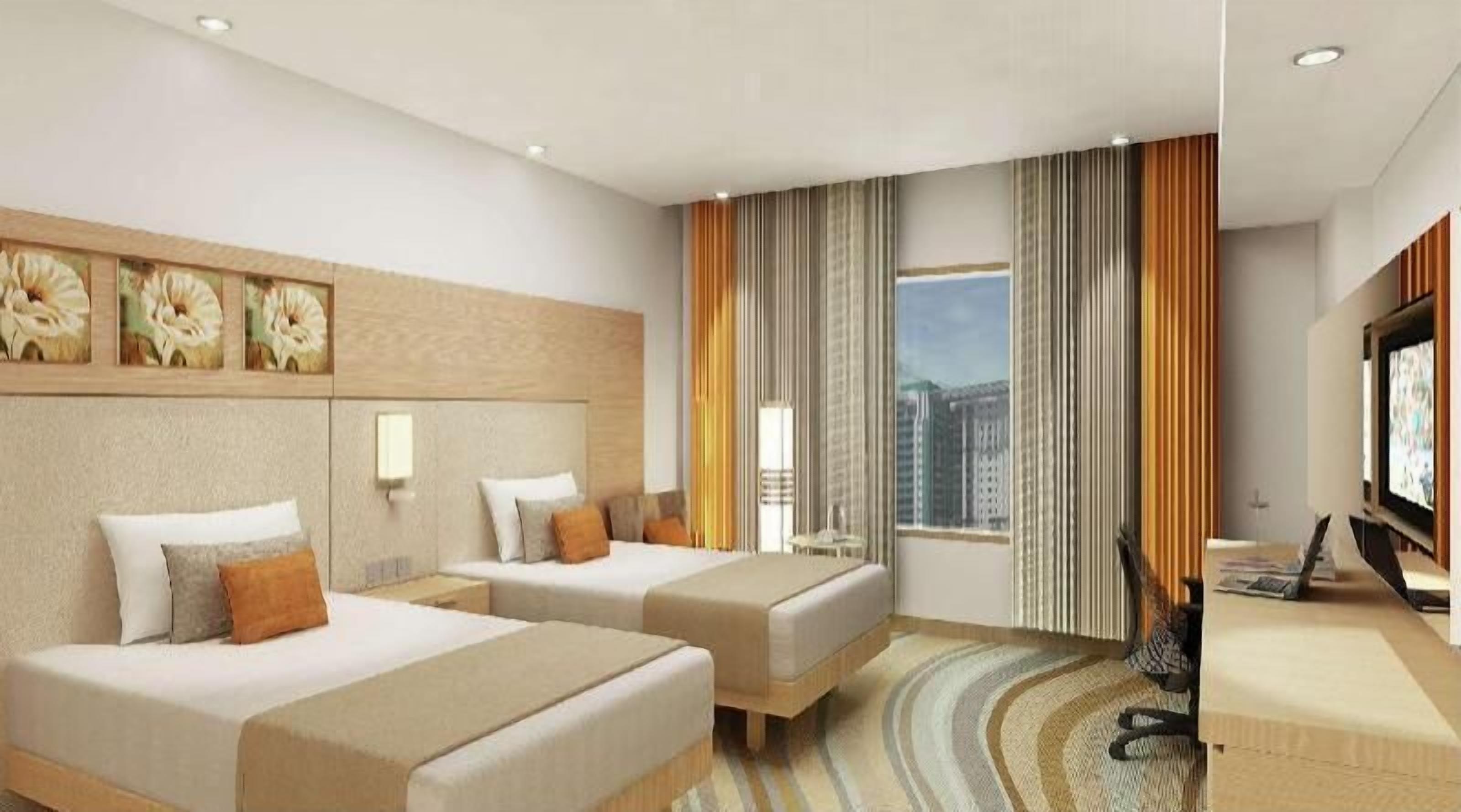 Luxe beddengoed, een kluis op de kamer, een bureau