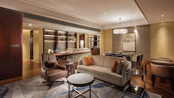 Deluxe Suite, 1 Bedroom | Living area | LCD TV, toys