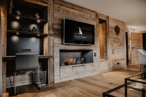 Apartment, Mountain View (home) | Living area | 49-inch flat-screen TV with cable channels, TV, Netflix - Black Eagle Luxury Appartement (Schwendau)