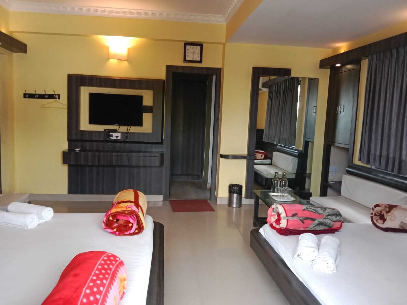 Family Quadruple Room, 4 Bedrooms, Partial Ocean View | Memory foam beds, individually furnished, free WiFi, bed sheets