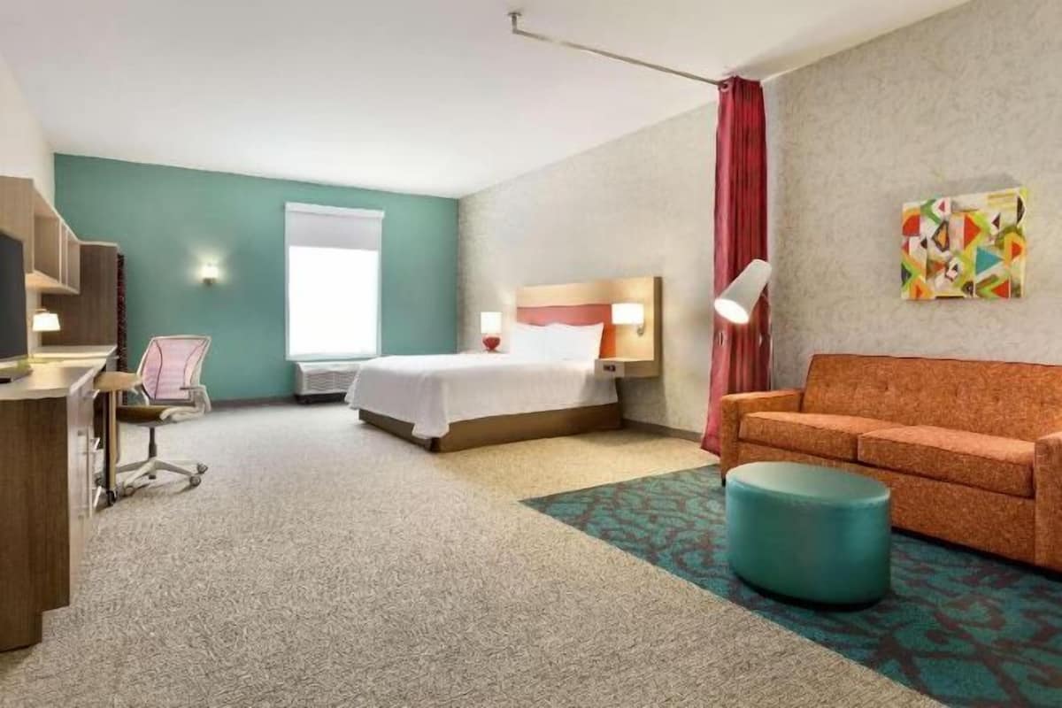 Hypo-allergenic bedding, pillowtop beds, desk, laptop workspace