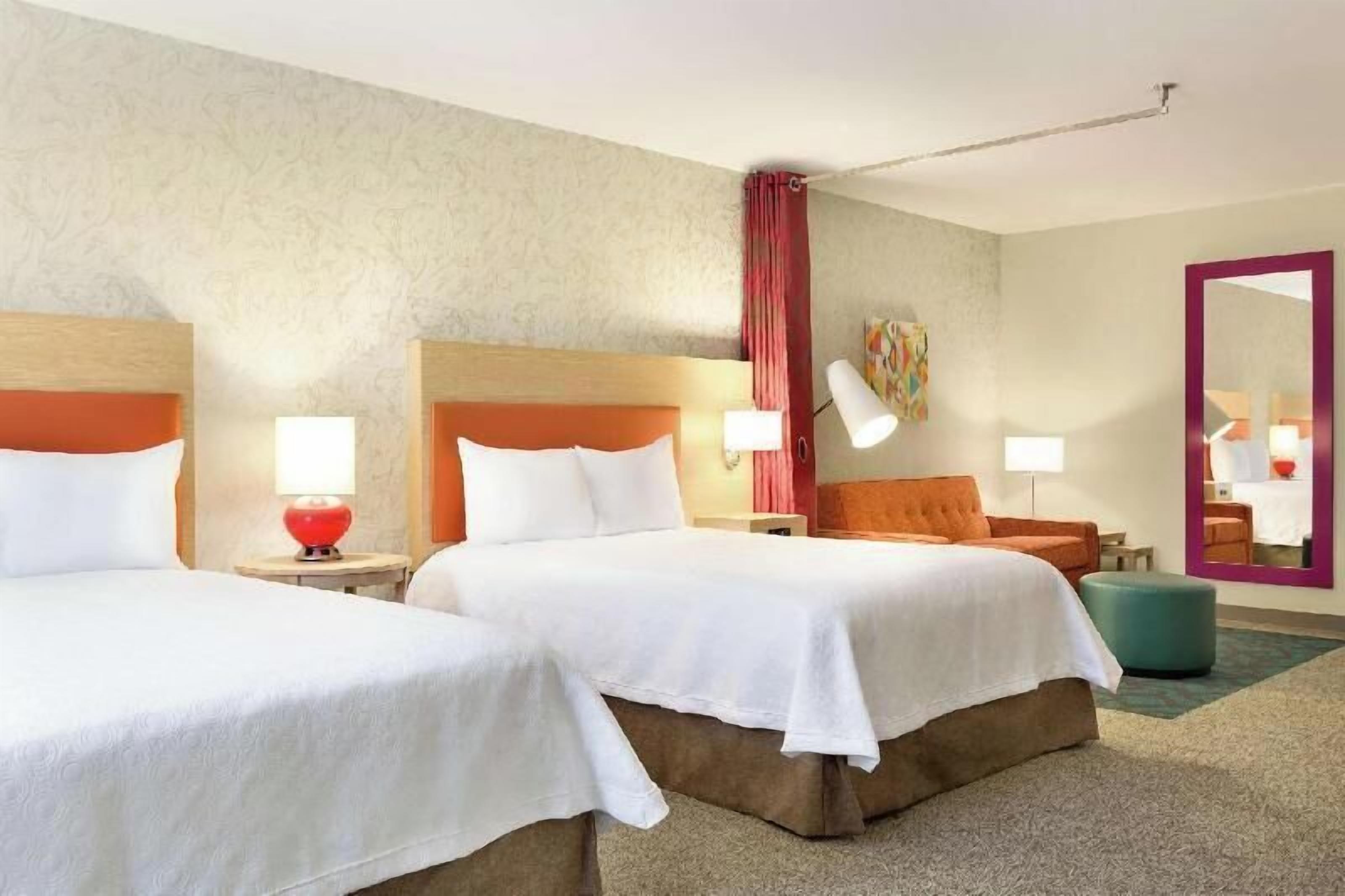 Hypo-allergenic bedding, pillow-top beds, desk, laptop workspace