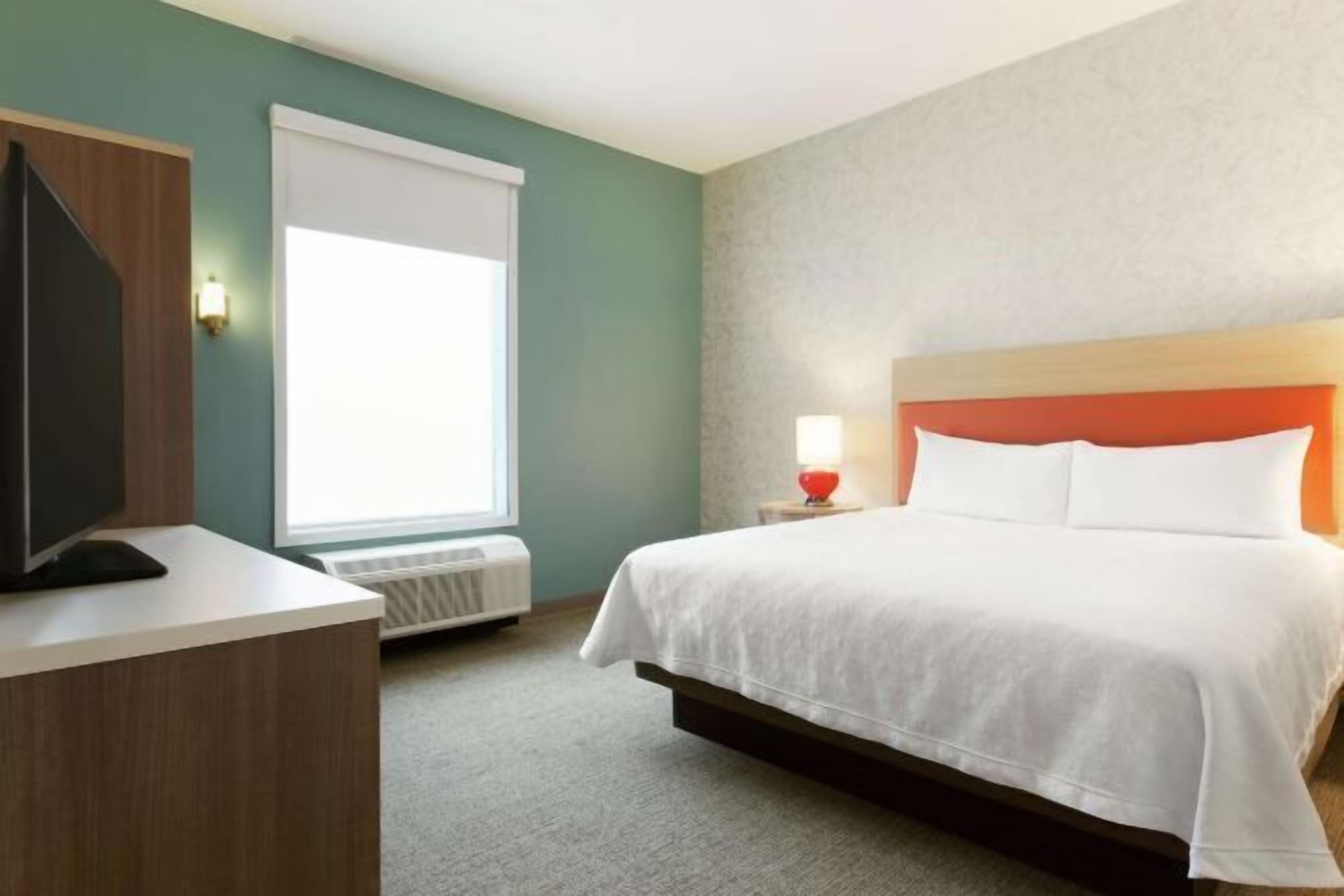 Hypo-allergenic bedding, pillow-top beds, desk, laptop workspace