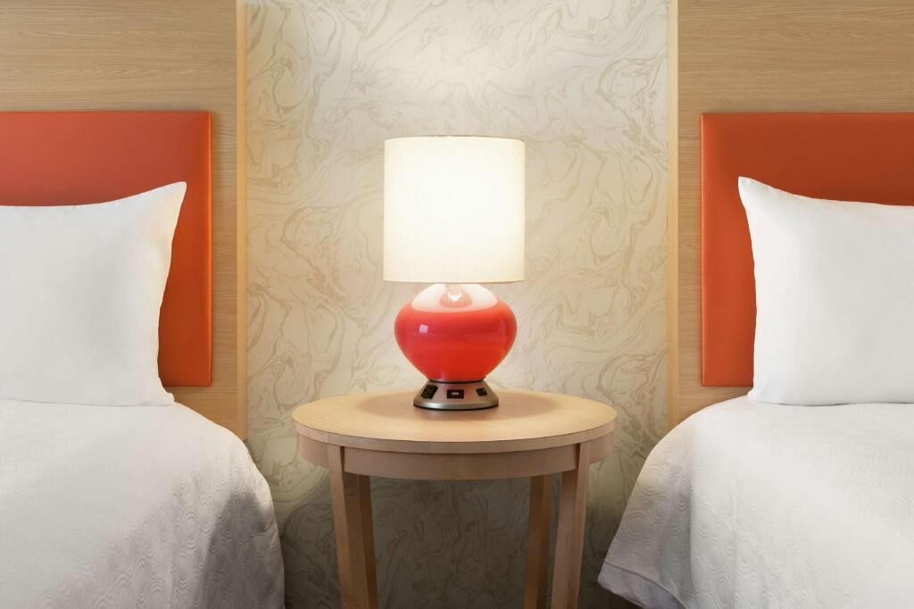 Hypo-allergenic bedding, pillow-top beds, desk, laptop workspace