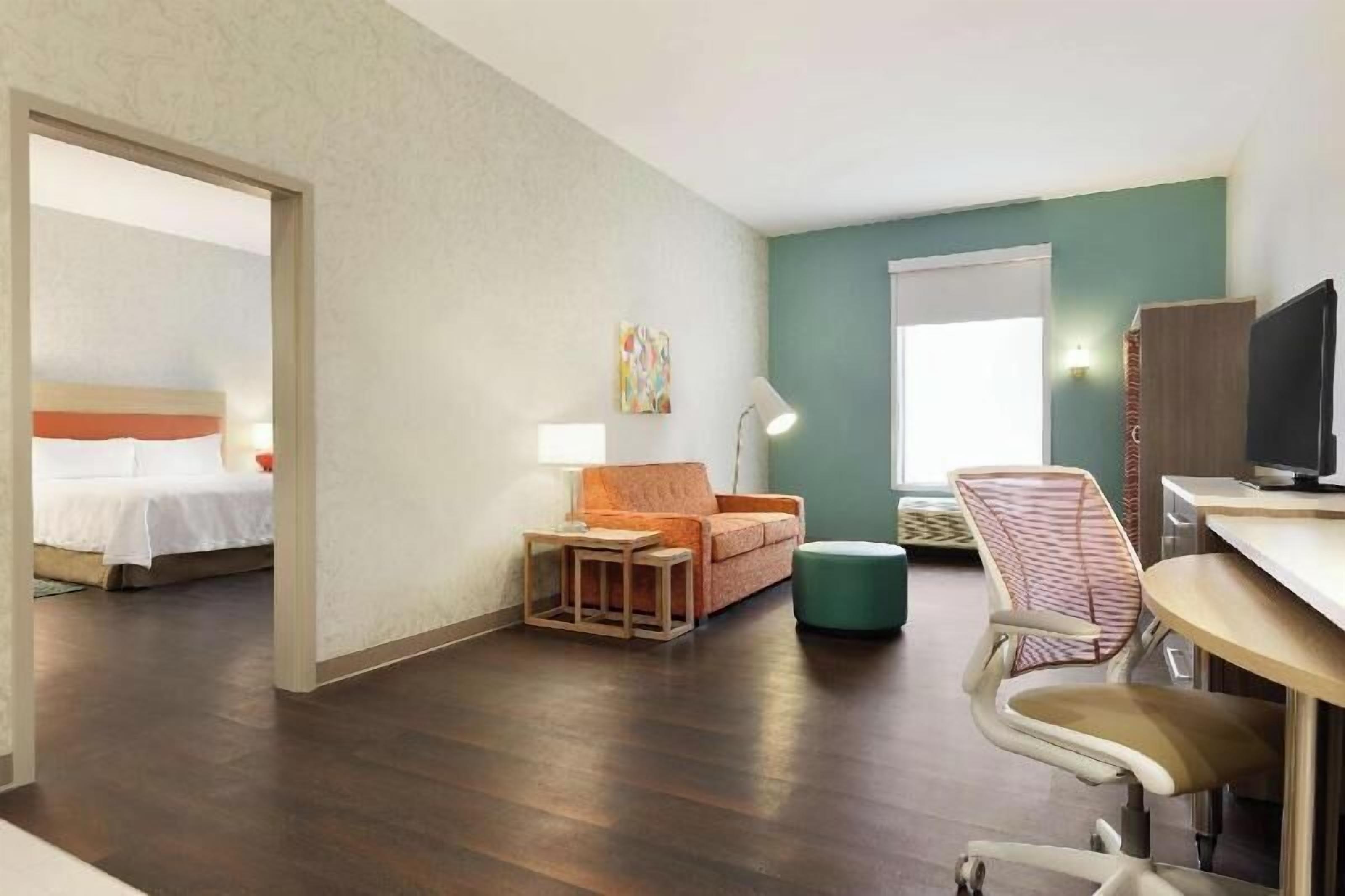 Hypo-allergenic bedding, pillow-top beds, desk, laptop workspace