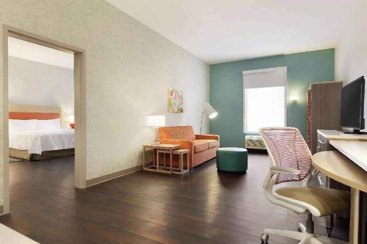 Hypo-allergenic bedding, pillowtop beds, desk, laptop workspace