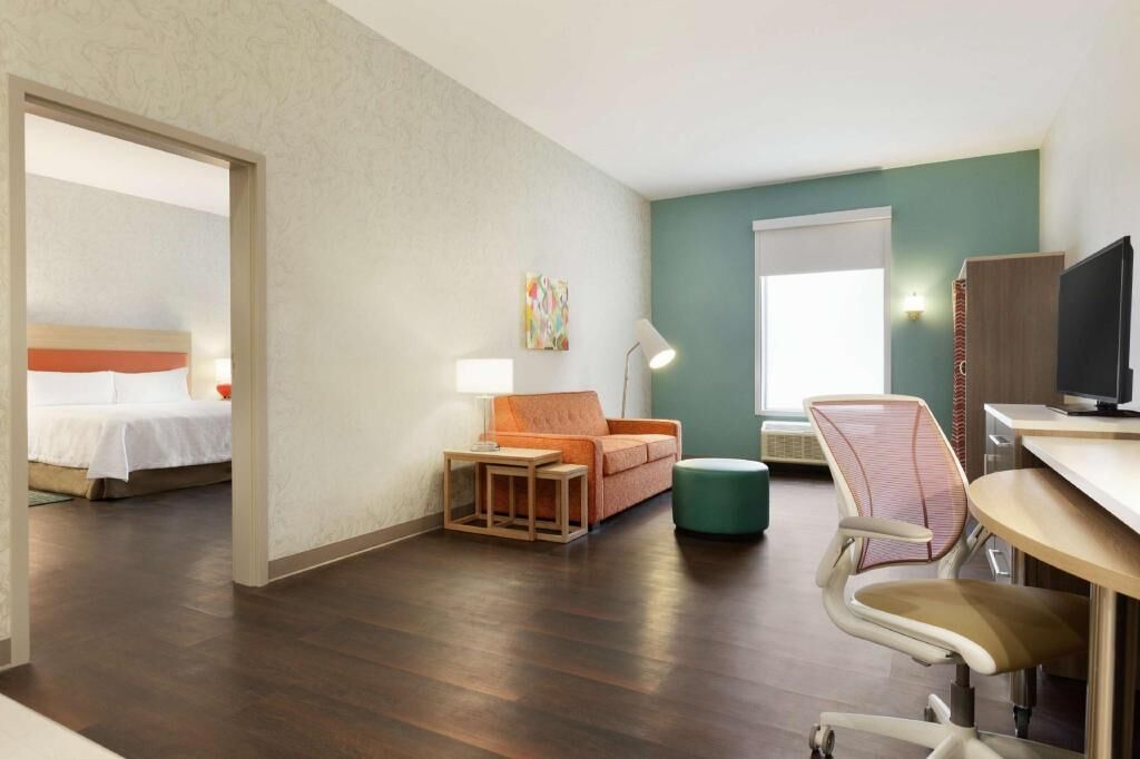 Hypo-allergenic bedding, pillow-top beds, desk, laptop workspace