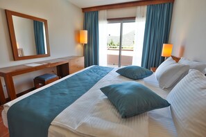 Ropa de cama de alta calidad y minibar 