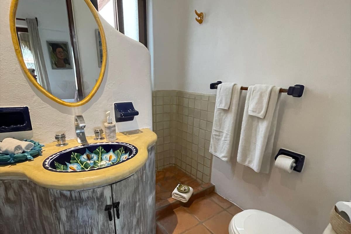 shower, hair dryer, bathrobes, towels
