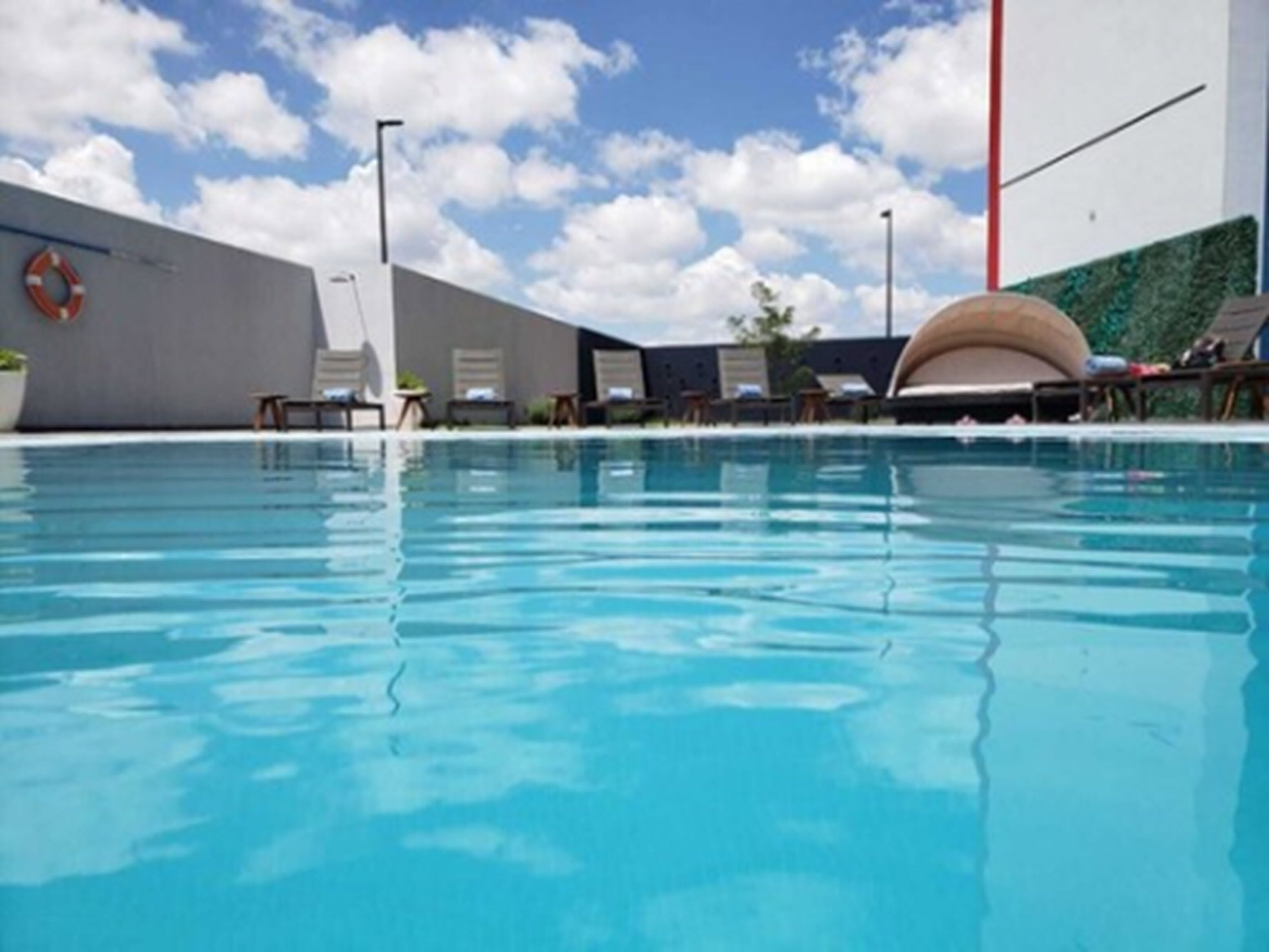 outdoor pool, open 7:00 am to 10:00 pm, pool loungers